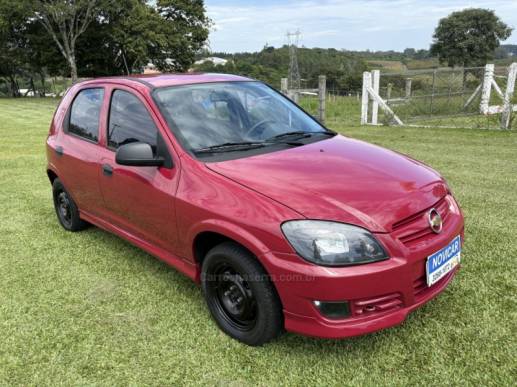 CHEVROLET - CELTA - 2008/2009 - Vermelha - R$ 25.900,00